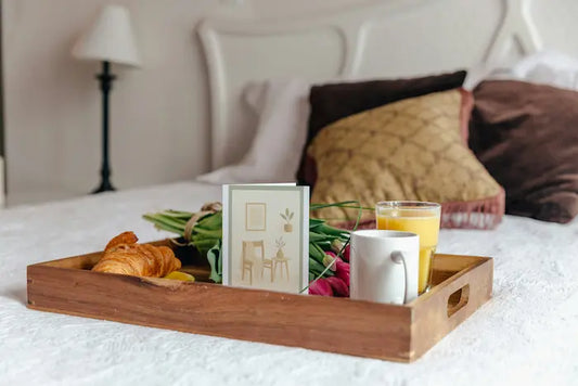 Wooden tray with breakfast items on a bed with Greeting CardQuiet Corner Printable 